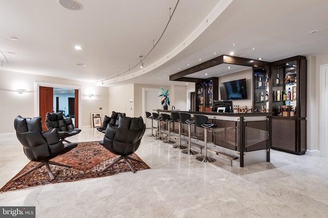 tiled living room with bar area