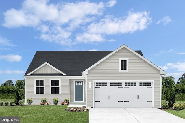 view of front facade with a garage and a front yard