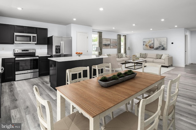 dining room featuring light wood-type flooring