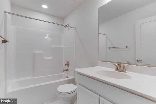 full bathroom with shower / bathing tub combination, vanity, and toilet