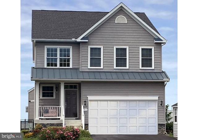 LOT16A Meadow St, Saint Michaels, MD 21663 - view of front of house with a porch, an attached garage, a standing seam roof, and asphalt driveway