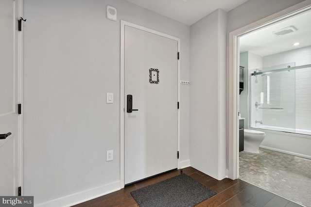 entryway featuring dark wood-type flooring