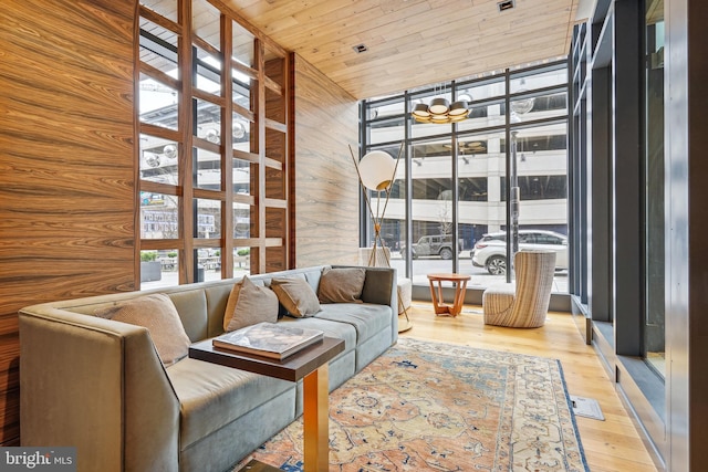 living room with wooden ceiling and light hardwood / wood-style floors