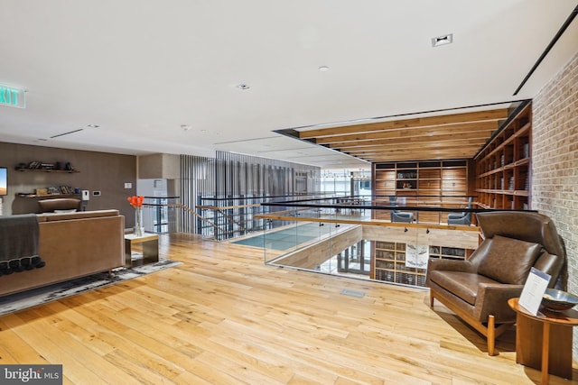 living room with light hardwood / wood-style flooring