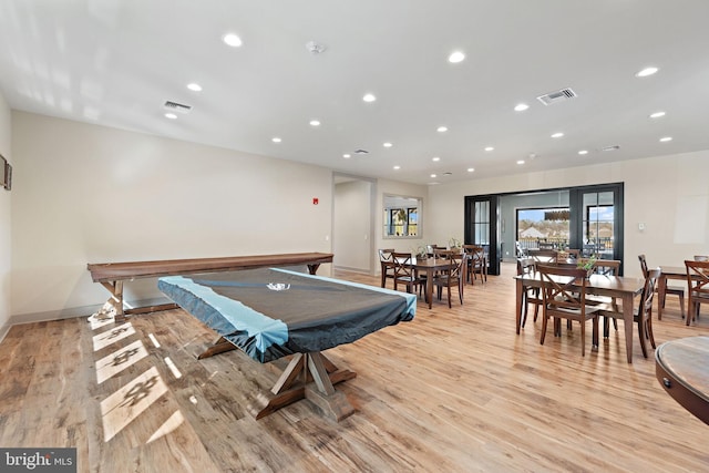 playroom featuring billiards and light hardwood / wood-style flooring