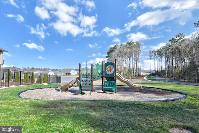 view of jungle gym with a lawn