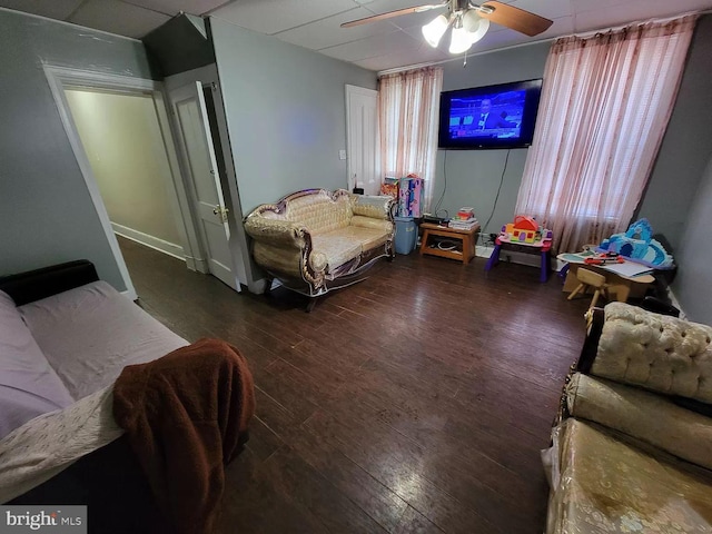 bedroom with dark wood-type flooring and ceiling fan