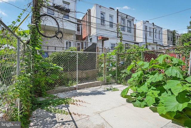 view of gate featuring fence private yard