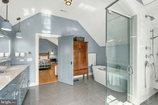 bathroom with hardwood / wood-style flooring, independent shower and bath, vanity, and lofted ceiling