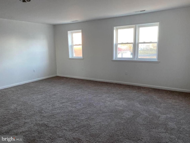 view of carpeted spare room