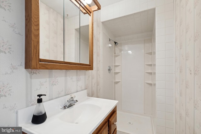 bathroom with a shower and oversized vanity