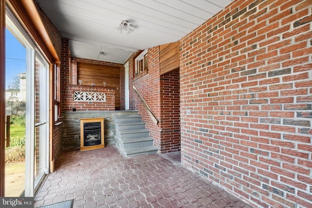 exterior space with a fireplace