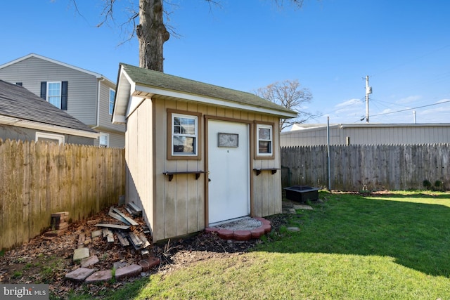 view of outdoor structure featuring a yard