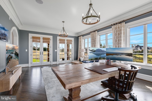 office area featuring a chandelier, dark hardwood / wood-style flooring, crown molding, and french doors