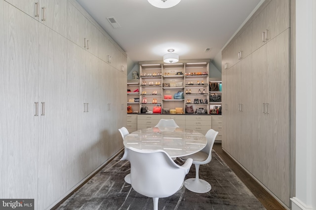 dining room with dark hardwood / wood-style floors