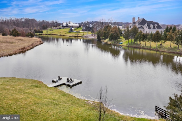 view of water feature with a dock