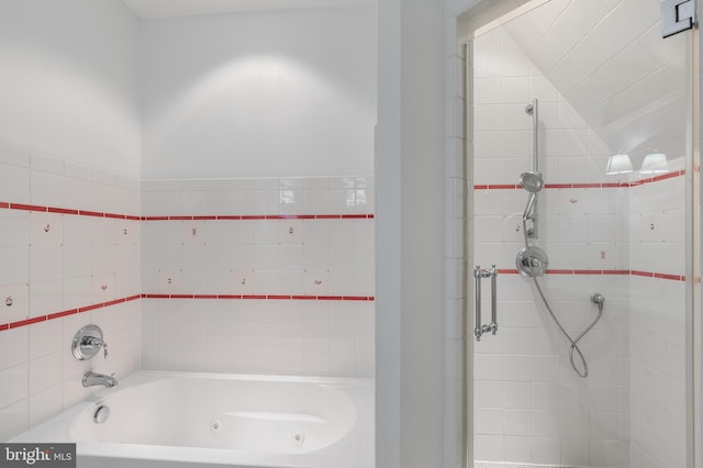 bathroom featuring a bathtub and vaulted ceiling