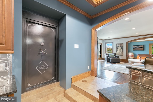 interior space featuring pool table, wood-type flooring, and ornamental molding