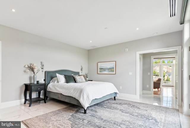 bedroom with light tile floors