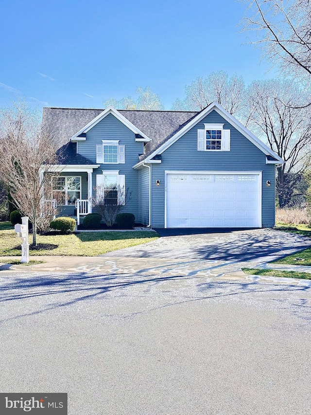 view of front of home featuring covered porch and a front yard