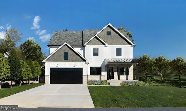 modern farmhouse with a porch and a front yard