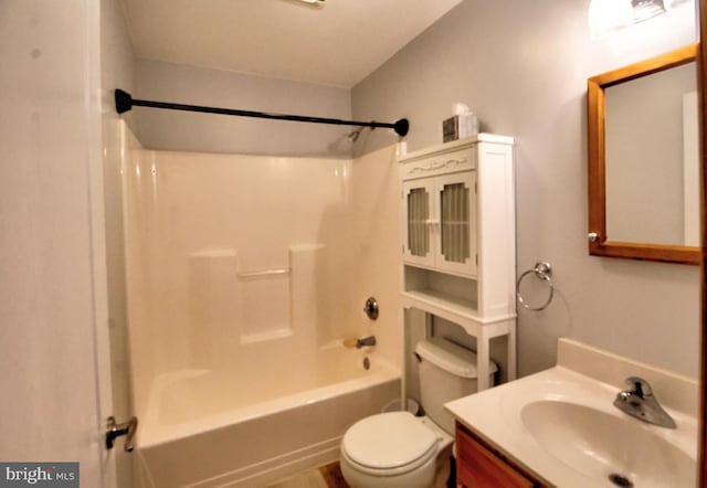 full bathroom with vanity, toilet, and shower / bathtub combination