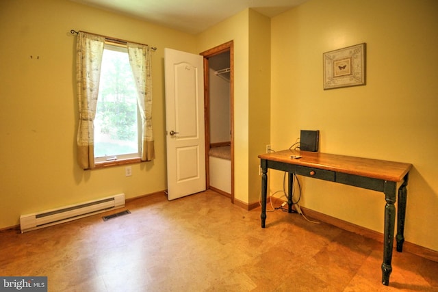 interior space featuring baseboard heating