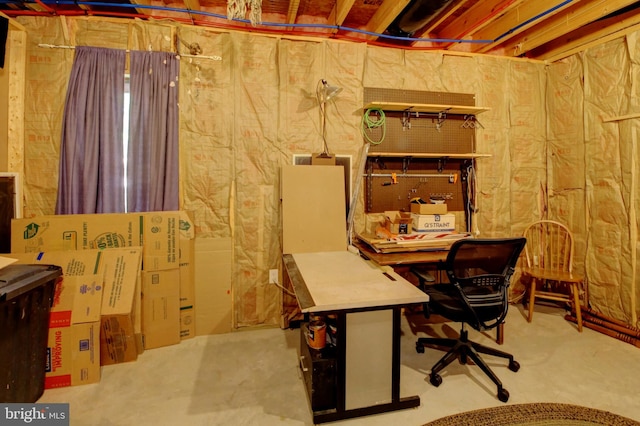 home office with concrete floors