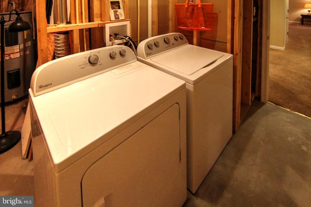 washroom with washer and clothes dryer and carpet