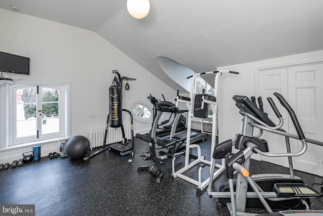 gym with vaulted ceiling