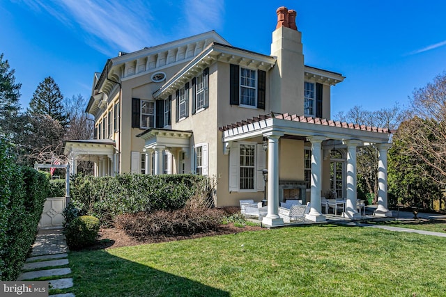 exterior space featuring a front lawn