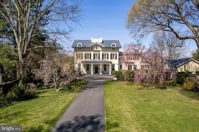 view of front of home with a front yard