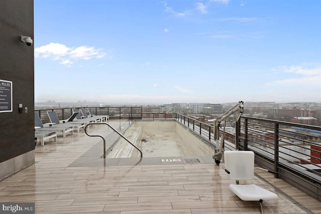 view of terrace with a balcony