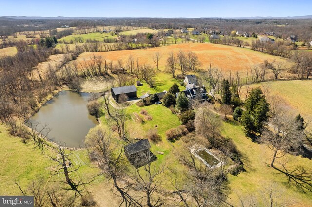 aerial view featuring a water view and a rural view