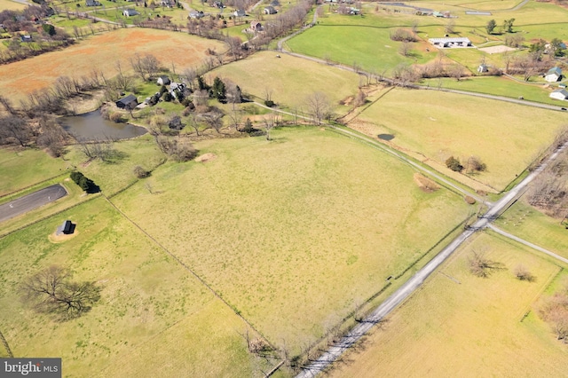 aerial view featuring a water view and a rural view