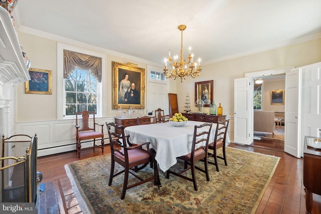 dining area featuring baseboard heating, a notable chandelier, dark hardwood / wood-style floors, and ornamental molding