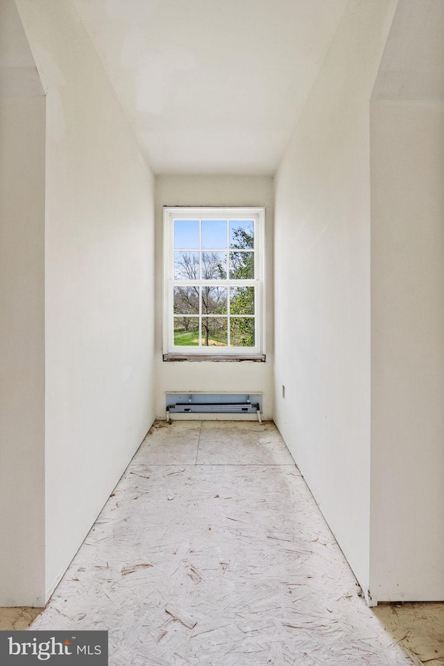 spare room with a baseboard radiator