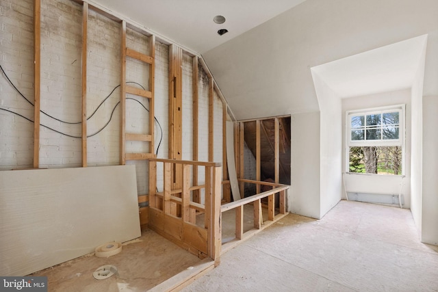 interior space featuring vaulted ceiling