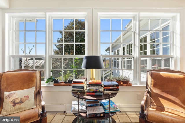 interior space featuring a baseboard heating unit