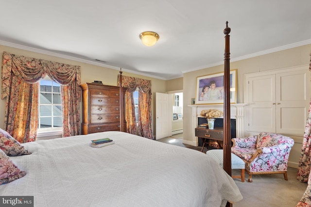 carpeted bedroom featuring a baseboard heating unit and ornamental molding