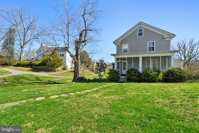 exterior space featuring a front yard