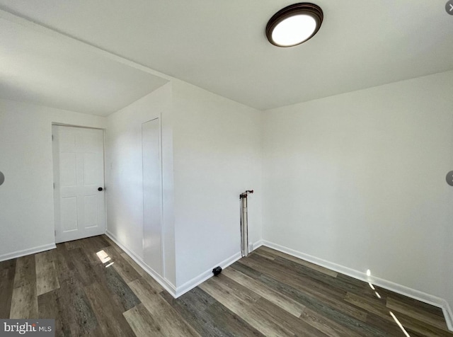 laundry room featuring dark hardwood / wood-style floors