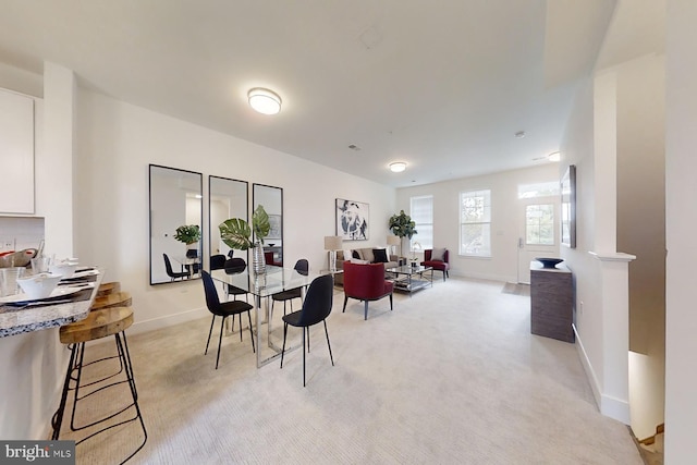 view of carpeted dining room