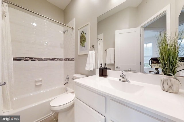 full bathroom with toilet, shower / bathtub combination with curtain, vanity with extensive cabinet space, and tile flooring