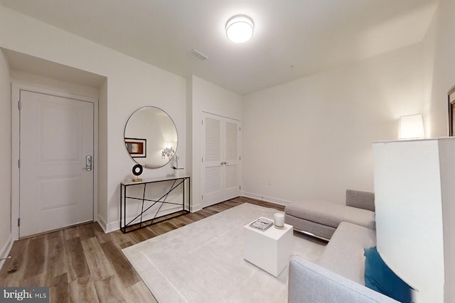 living area with wood-type flooring