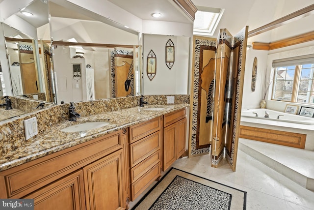 bathroom with lofted ceiling, dual bowl vanity, tile floors, and a bathtub