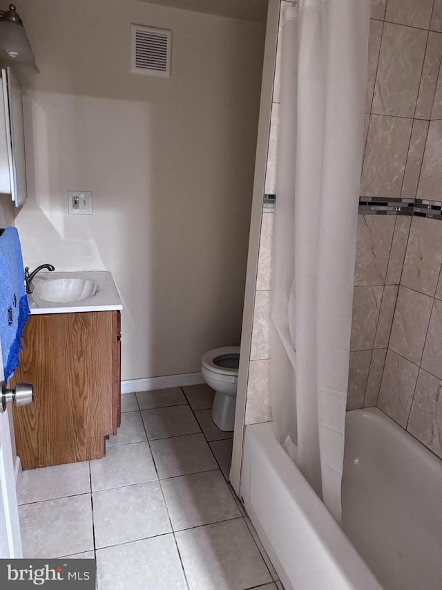 full bathroom featuring vanity, tile floors, shower / tub combo with curtain, and toilet