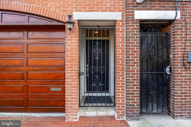 property entrance featuring a garage