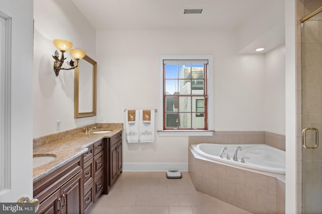 bathroom featuring shower with separate bathtub, double sink vanity, and tile flooring