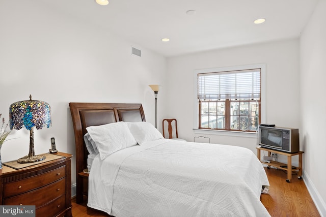 bedroom featuring hardwood / wood-style flooring